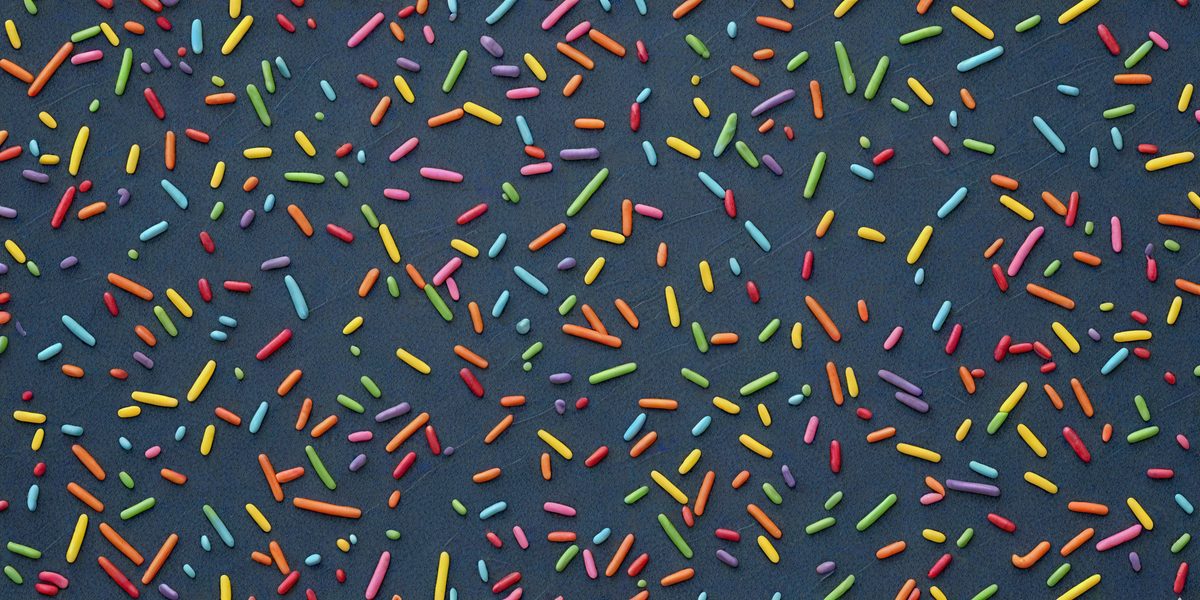 freepik__rainbow-sprinkles-on-dark-slate-blue-background__36794_251013015551_00001.png